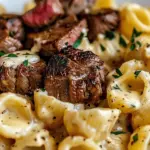 Steak Bites and Shell Pasta in Garlic Butter Alfredo Sauce